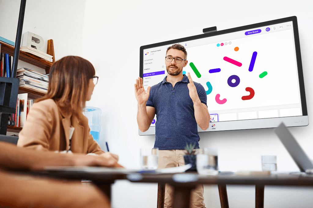 Presenting in front of a Vibe interactive whiteboard.