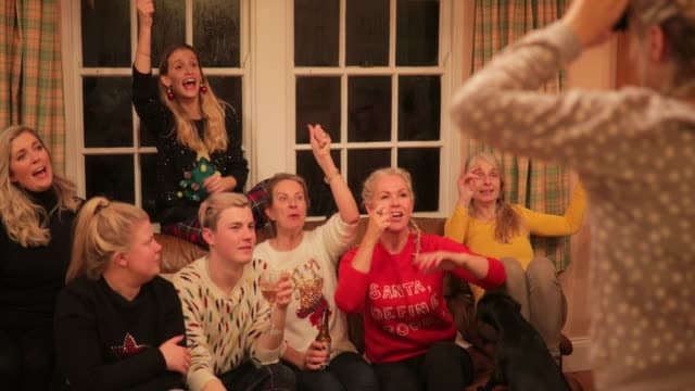 Having a game of Christmas charades with team