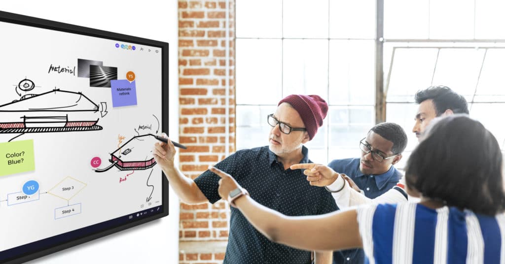 Team working together on a Vibe Smartboard