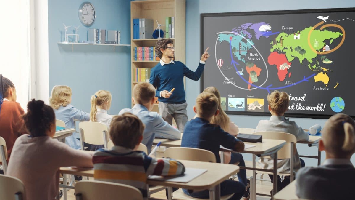 teacher using a Vibe Smartboard