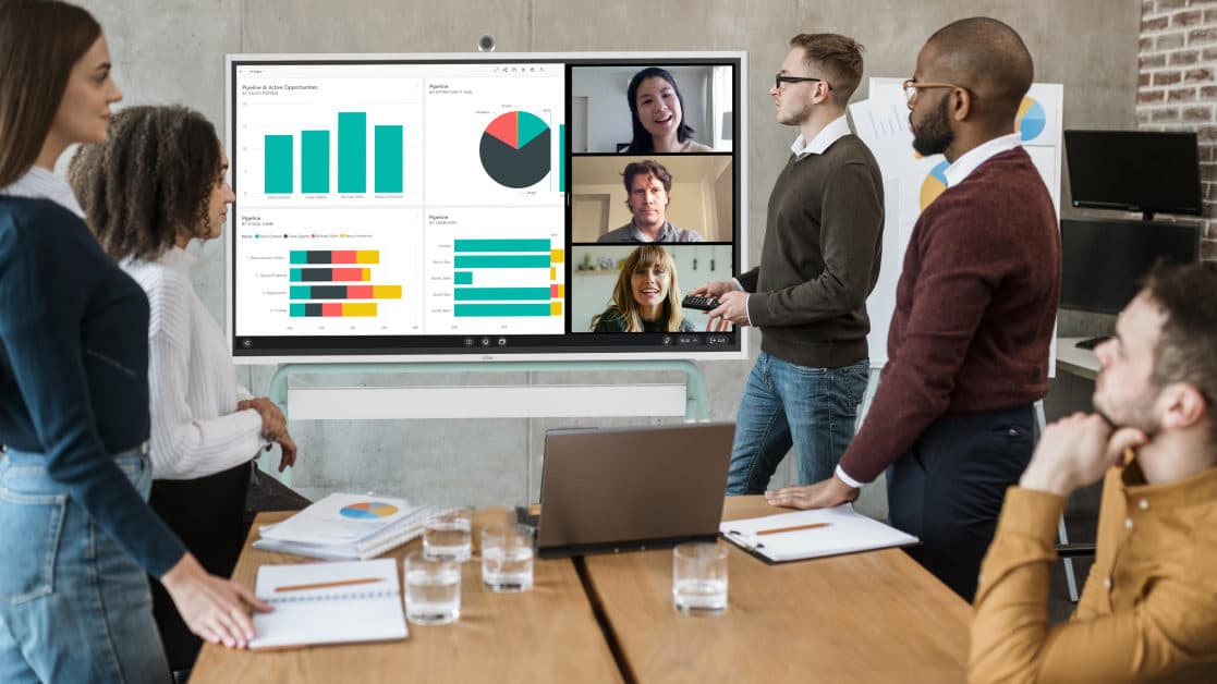 Team conducting virtual meeting using Vibe smart whiteboard for remote collaboration.