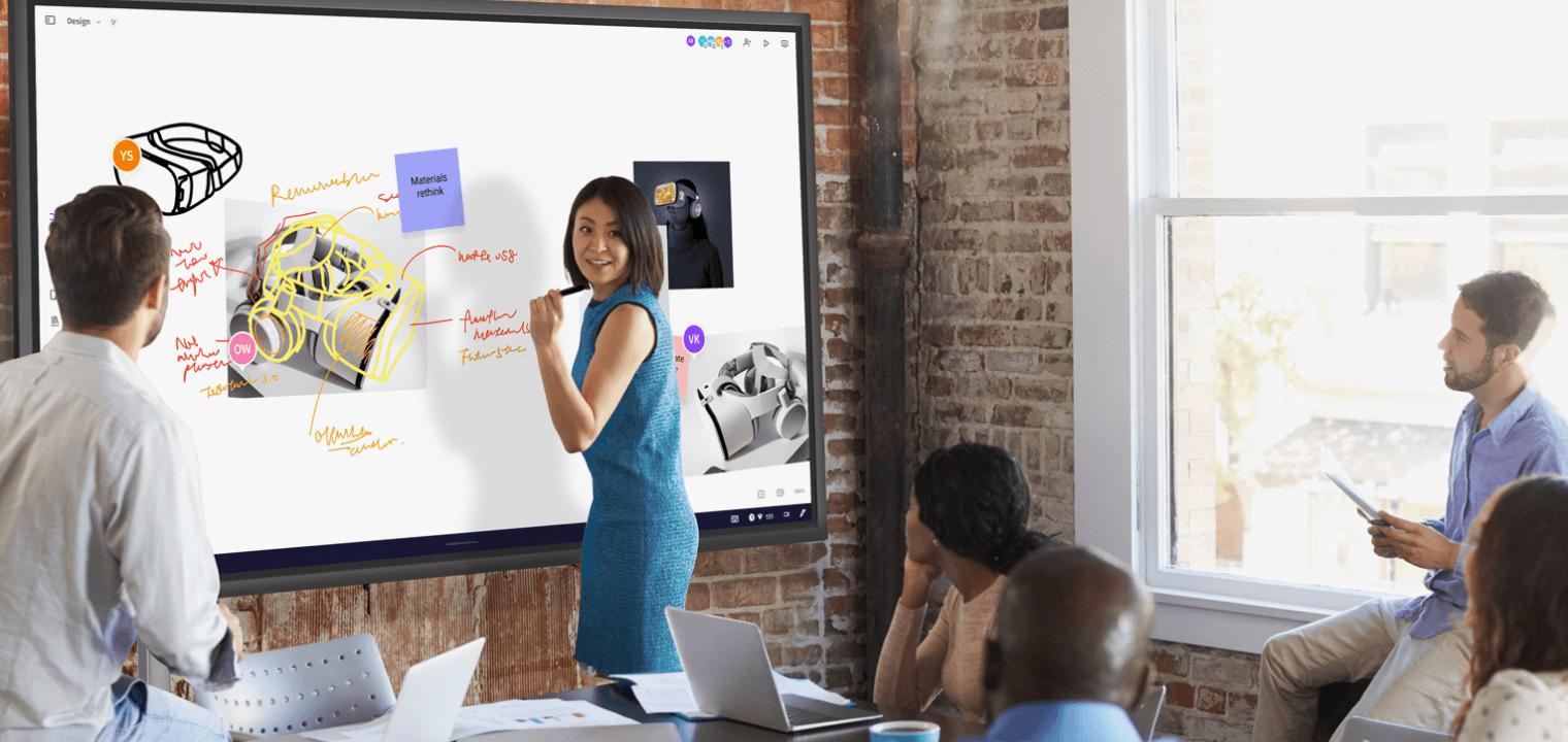 Team using a Vibe Board for visual communication to share and empower ideas.